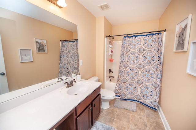 full bathroom featuring shower / bath combo, vanity, tile patterned floors, and toilet