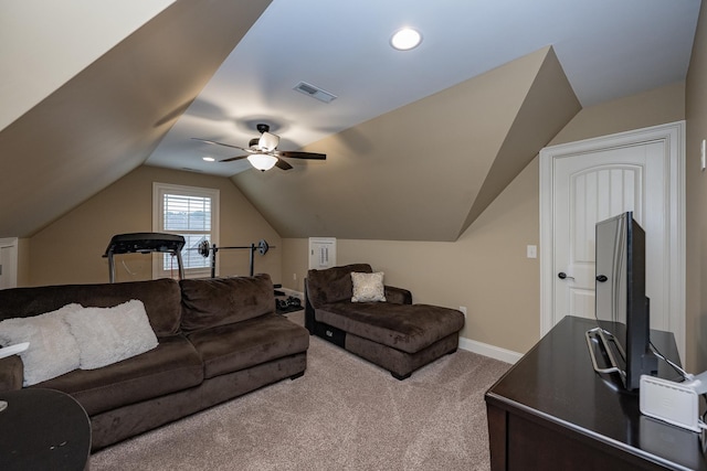 living room with vaulted ceiling and carpet