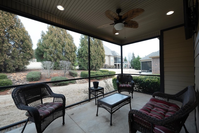 sunroom / solarium with ceiling fan