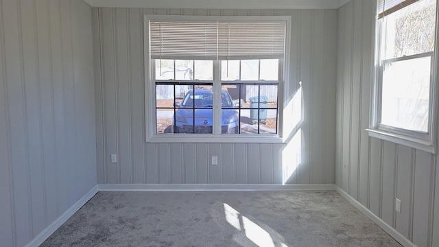 spare room featuring carpet floors