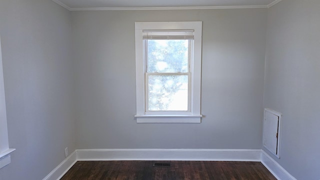 unfurnished room with dark hardwood / wood-style flooring and crown molding