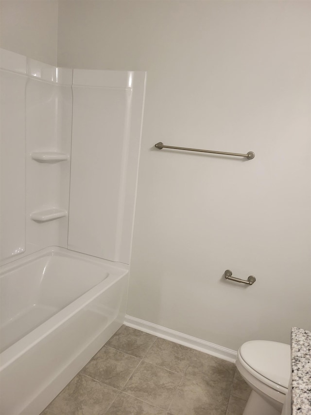 bathroom featuring shower / bathtub combination, toilet, and tile patterned flooring