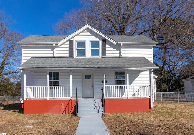 bungalow-style house with a porch and a front yard