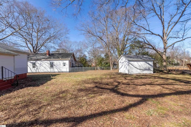 view of yard with a storage shed