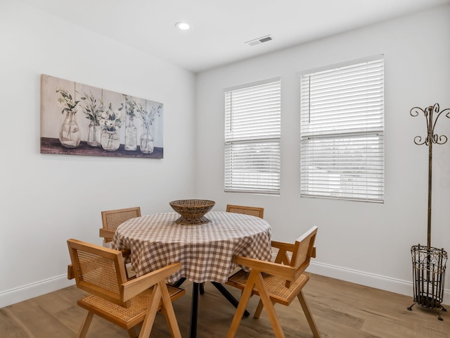 dining area featuring light wood-type flooring