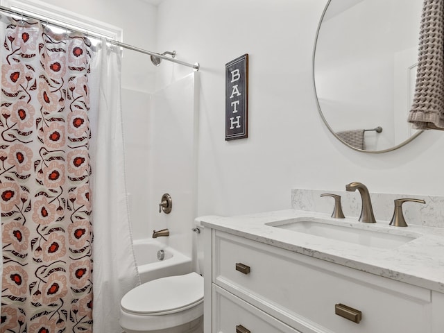 full bathroom featuring vanity, toilet, and shower / bath combo with shower curtain