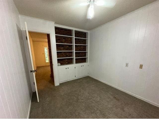 unfurnished bedroom featuring carpet flooring