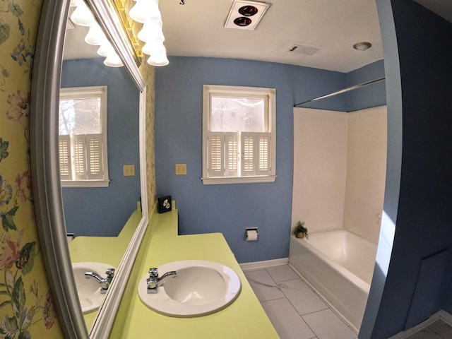 bathroom with vanity and a healthy amount of sunlight