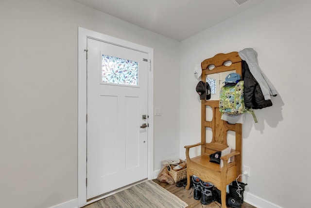 foyer entrance featuring hardwood / wood-style flooring