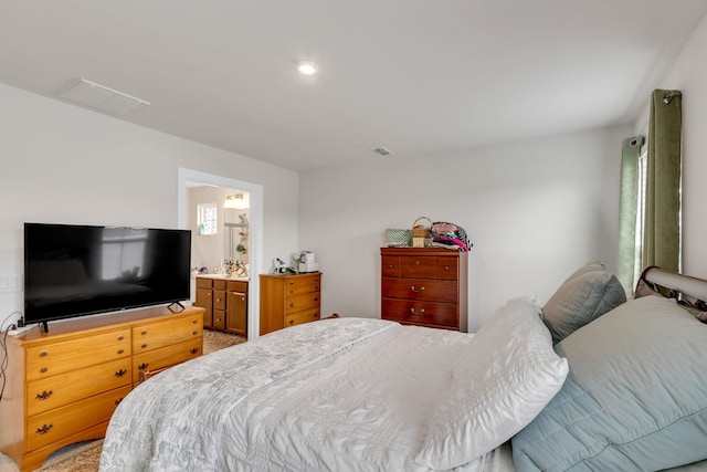 bedroom with ensuite bathroom