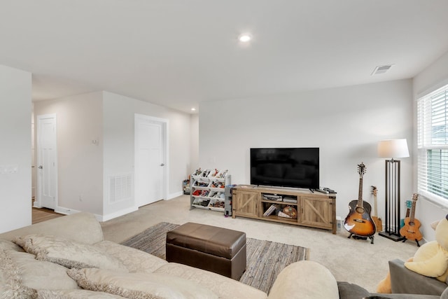 living room featuring carpet