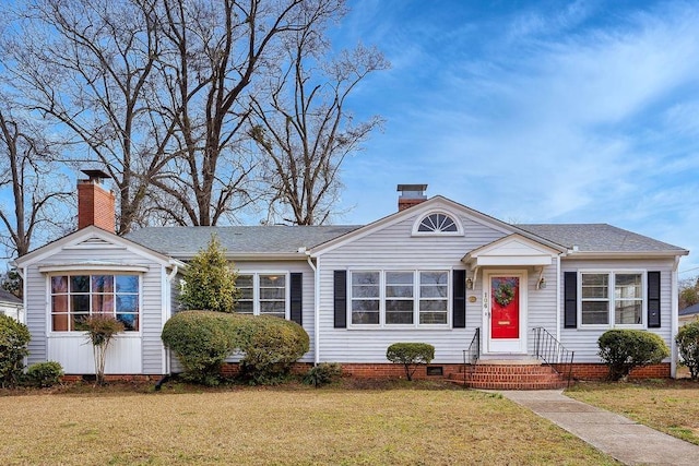 view of front of home with a front yard