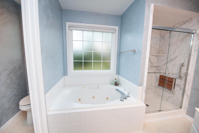 bathroom featuring separate shower and tub and toilet