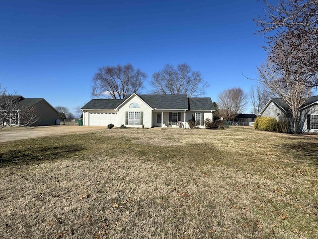 single story home featuring a garage and a front lawn