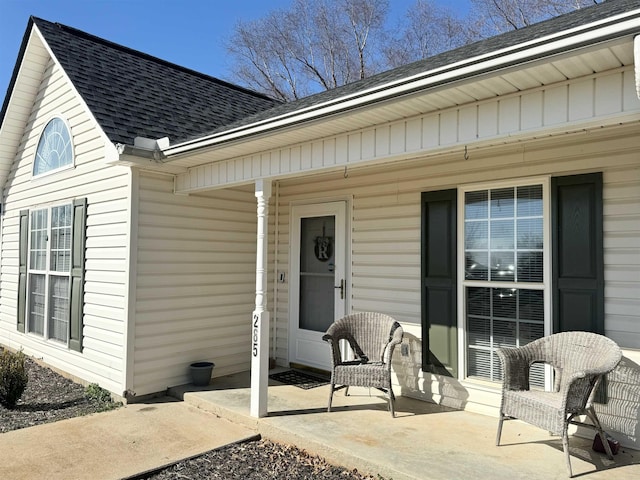 entrance to property featuring covered porch