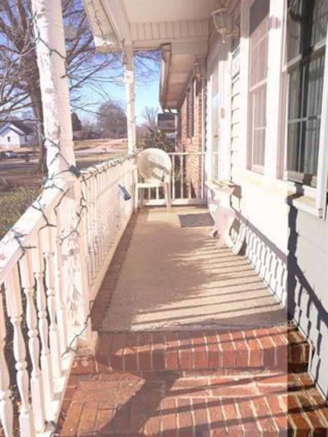 exterior space featuring covered porch