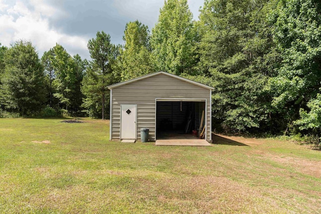 841 Browning, Enoree, SC 29335 - view of outbuilding featuring a garage and a yard