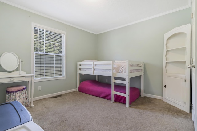 bedroom featuring ornamental molding and light carpet