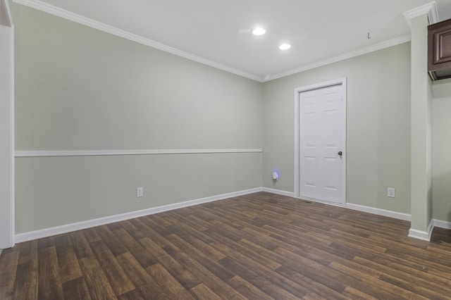 unfurnished room featuring crown molding and dark hardwood / wood-style floors