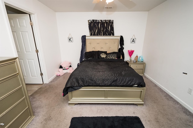 bedroom featuring ceiling fan and light colored carpet