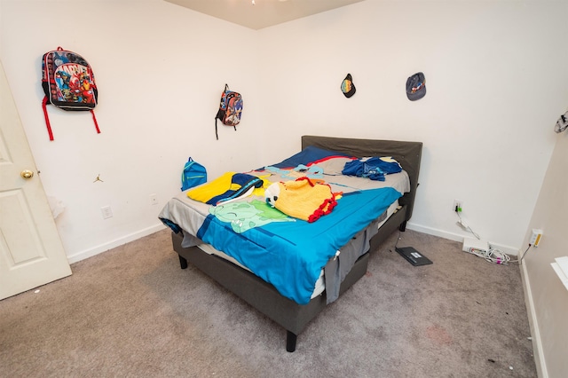 bedroom with light colored carpet