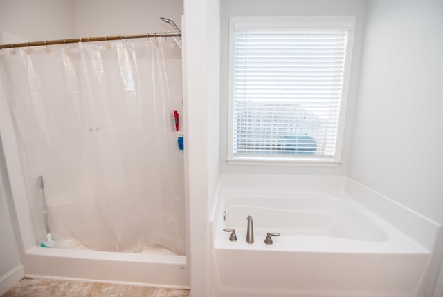 bathroom featuring curtained shower