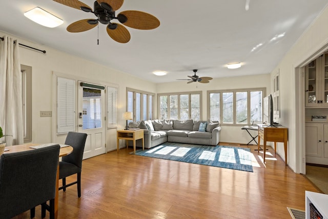 living room with light hardwood / wood-style floors