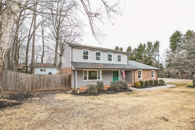 front facade with a front lawn