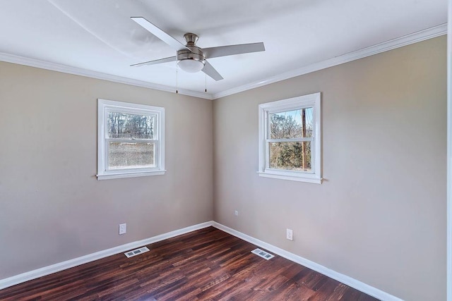 unfurnished room with dark wood-type flooring, ornamental molding, and ceiling fan