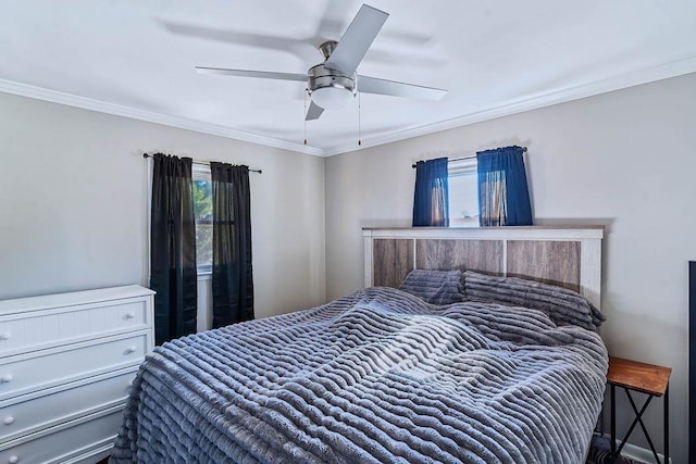 bedroom featuring crown molding and ceiling fan