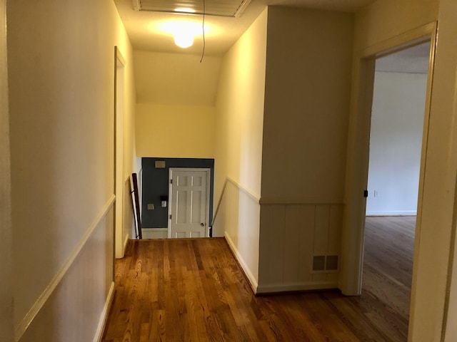 corridor with dark wood-type flooring