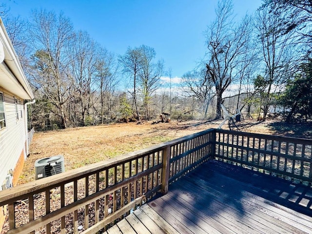 wooden deck with central AC unit