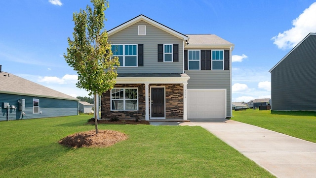 view of front facade with a garage and a front yard