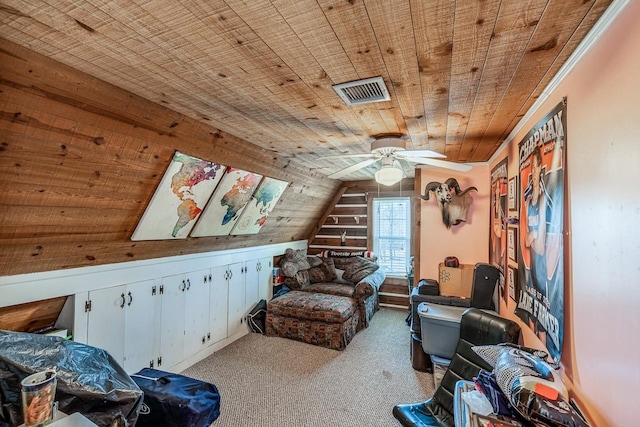 living area featuring wood ceiling, vaulted ceiling, light colored carpet, and ceiling fan