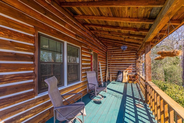 wooden deck featuring covered porch