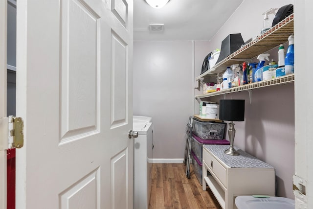 storage room with washer and dryer