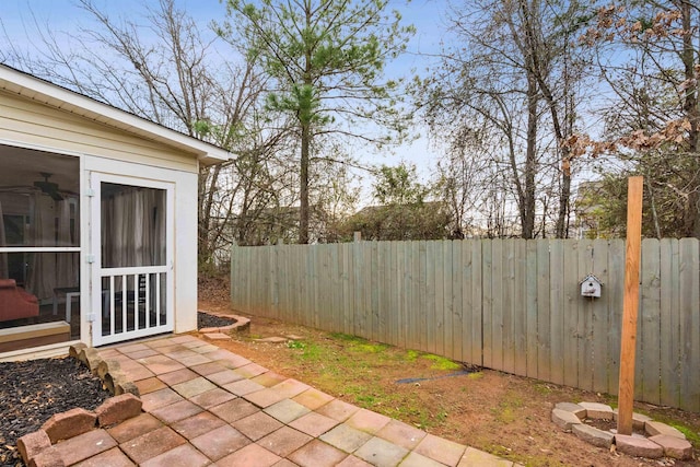 view of patio with an outbuilding