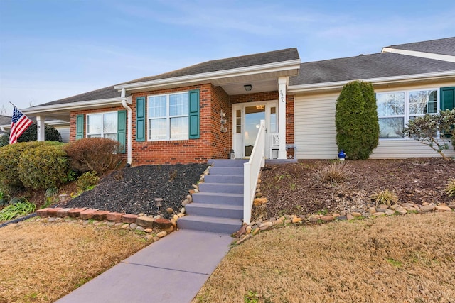 ranch-style house with a front lawn