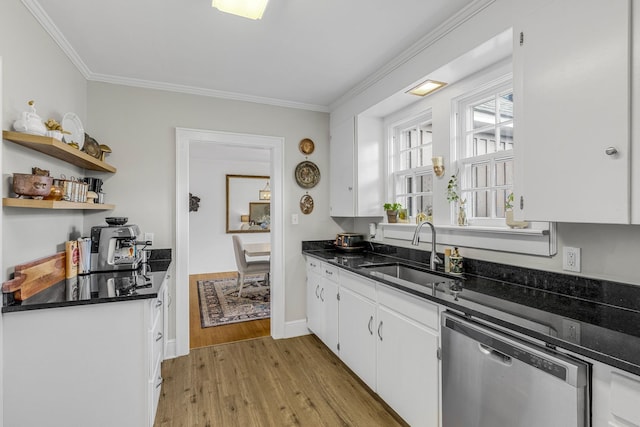 kitchen with white cabinetry, sink, stainless steel dishwasher, crown molding, and light wood-type flooring