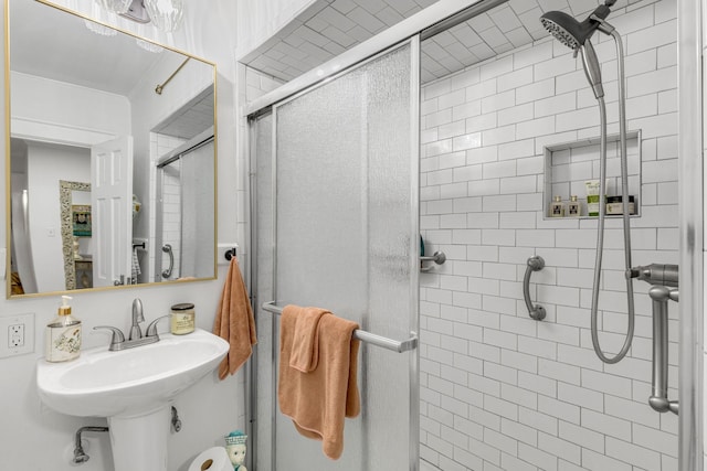 bathroom featuring sink and walk in shower