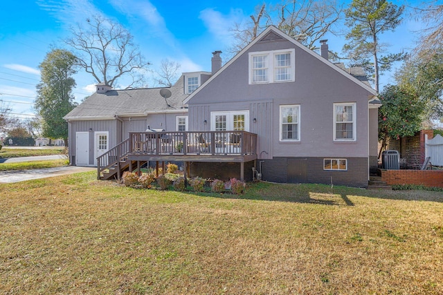 back of house featuring a yard, central air condition unit, and a deck