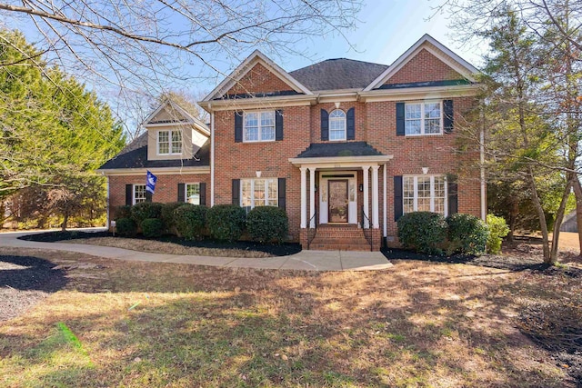 view of front of home with a front lawn