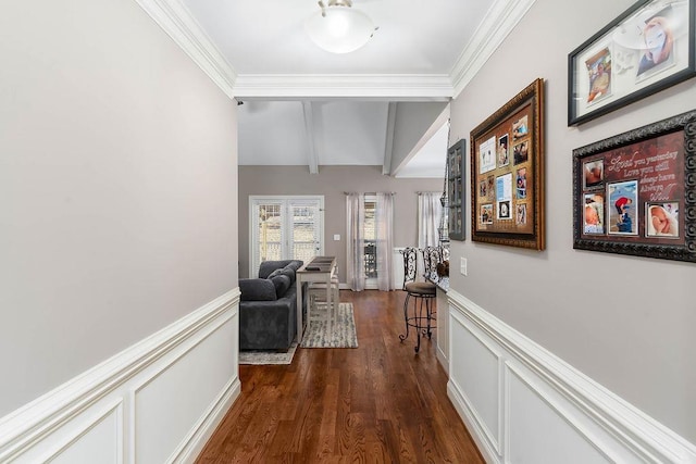 hallway featuring lofted ceiling with beams, ornamental molding, and dark wood-type flooring