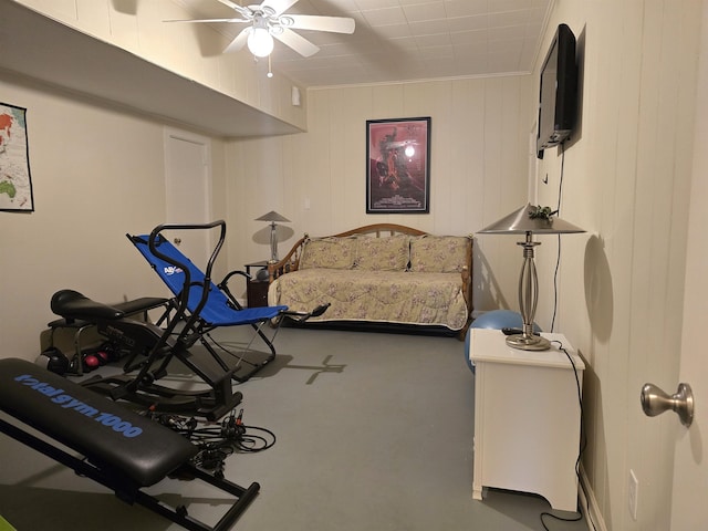 workout area featuring ceiling fan and carpet floors