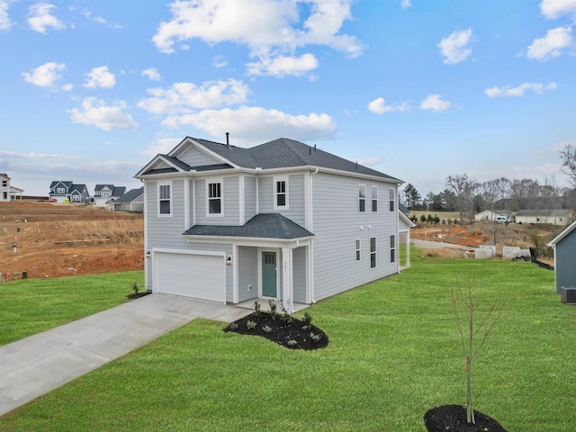 front facade with a garage and a front yard