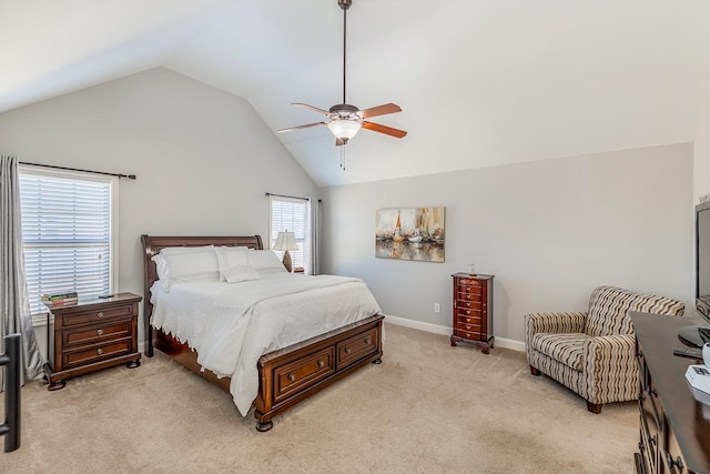 carpeted bedroom with ceiling fan and lofted ceiling