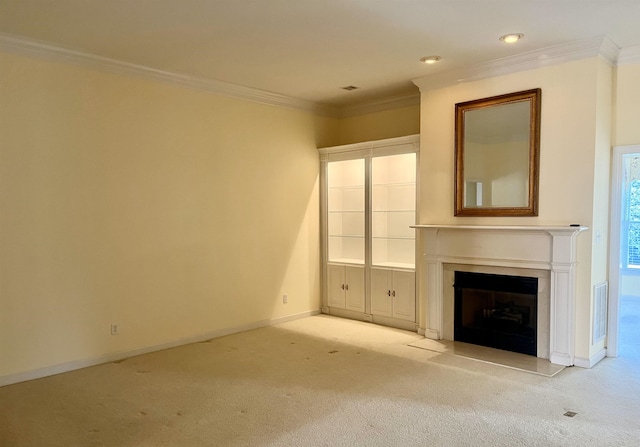 unfurnished living room with crown molding and light carpet