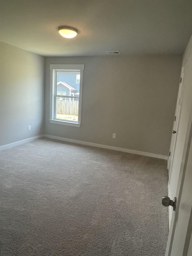 view of carpeted spare room