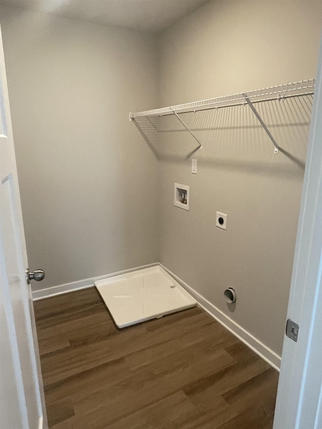 laundry room featuring washer hookup, hookup for an electric dryer, and dark hardwood / wood-style flooring