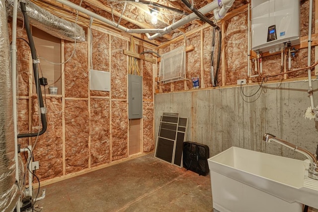 bathroom featuring sink, electric panel, and tankless water heater